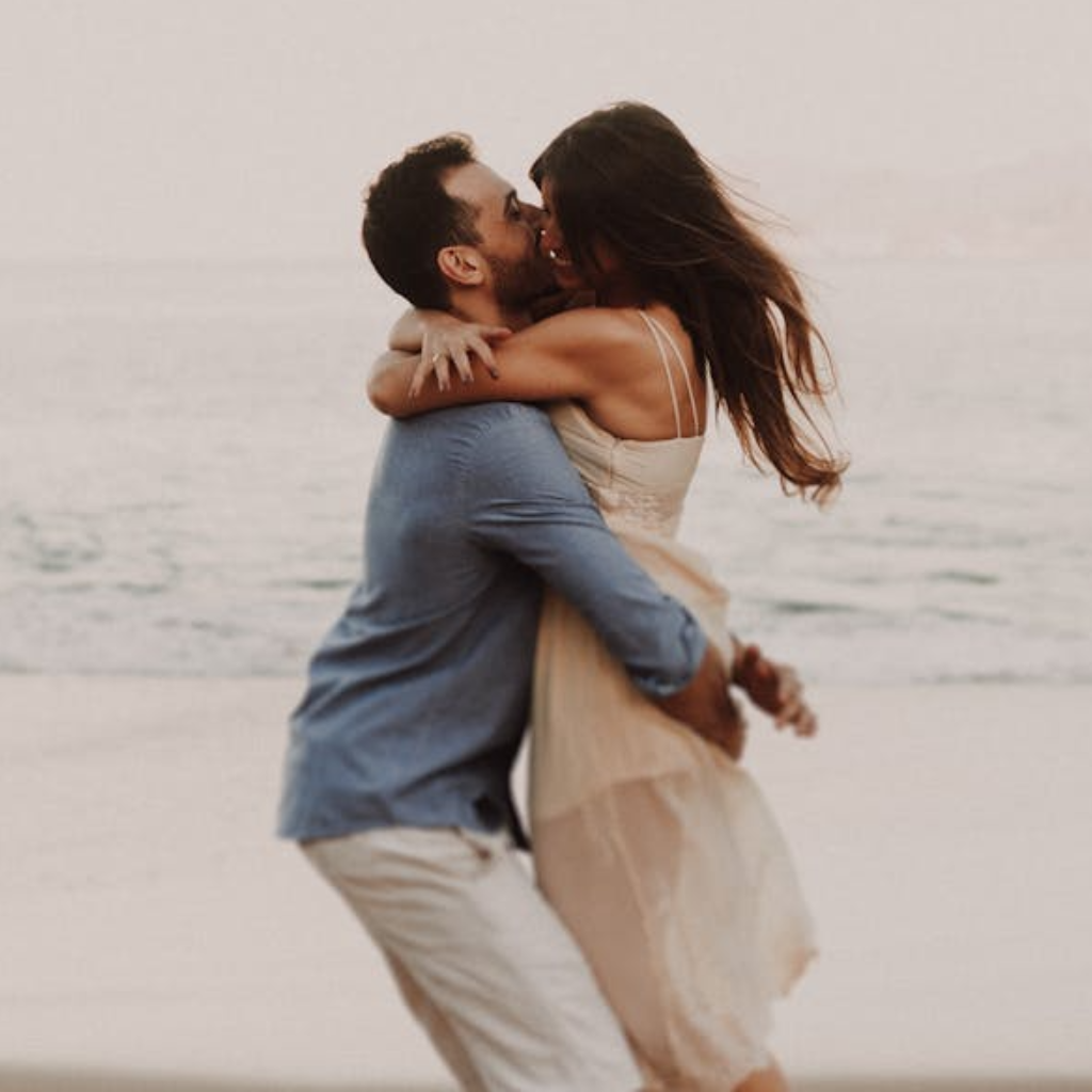 Couple hugging on the beach