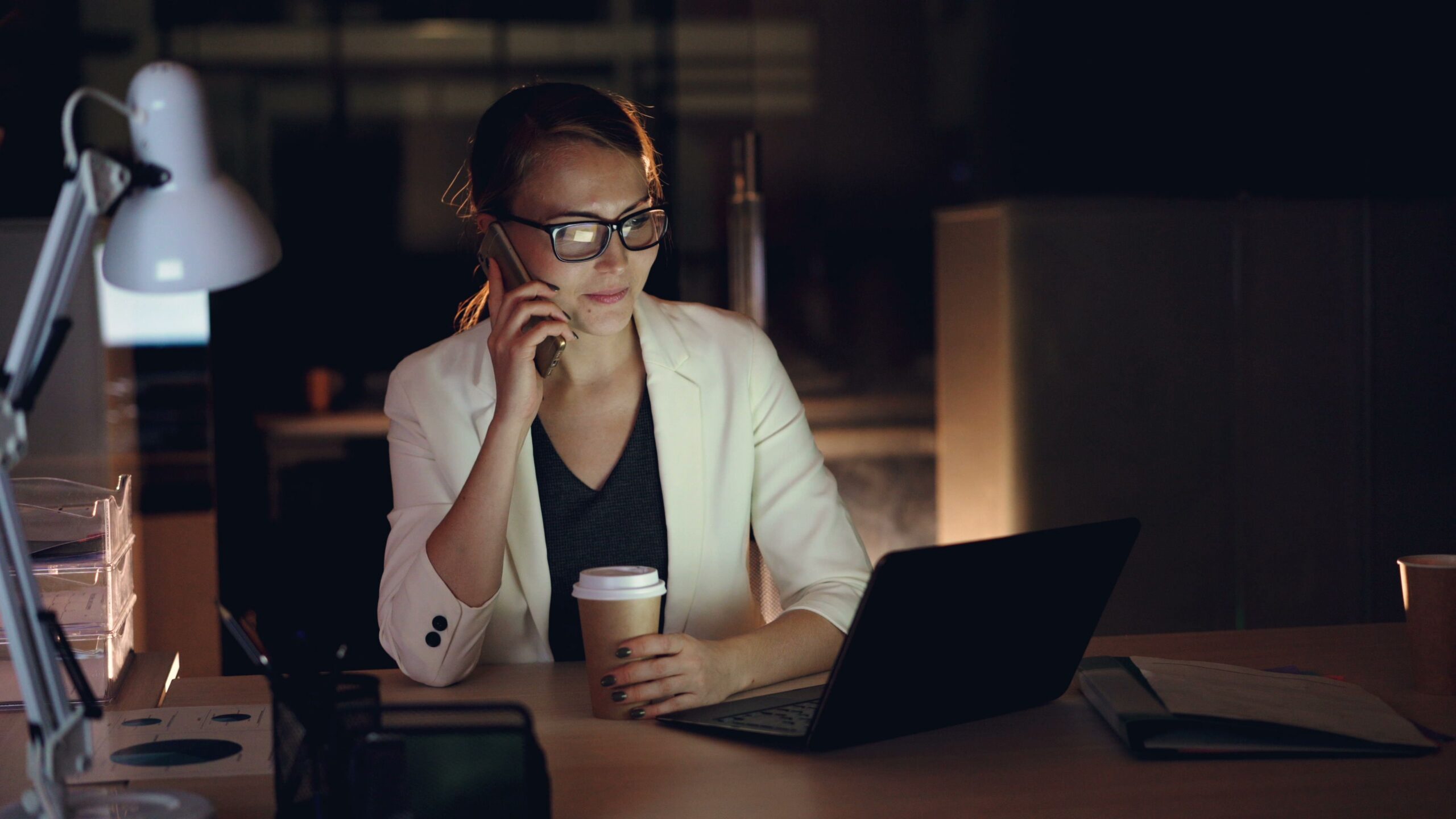 startup founder working late in an office feeling overwhelmed